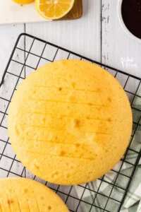 baked gluten free lemon cakes cooling on a wire rack.