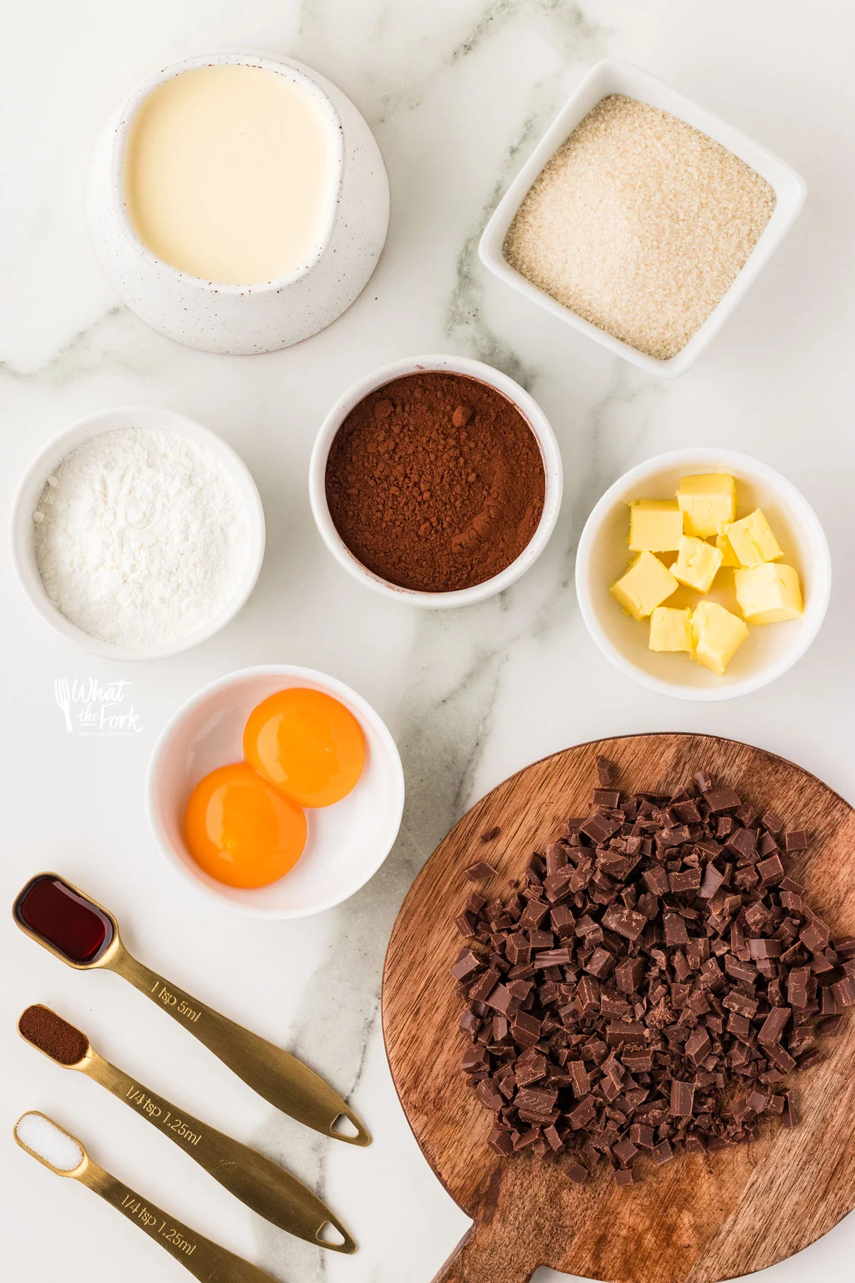 ingredients in individual bowls and measuring spoons to make an Easy Gluten Free Chocolate Pudding Recipe