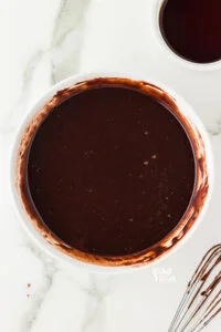 coffee stirred into chocolate cupcake batter