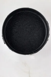 overhead shot of a black 9-inch springform that has been sprayed with nonstick spray