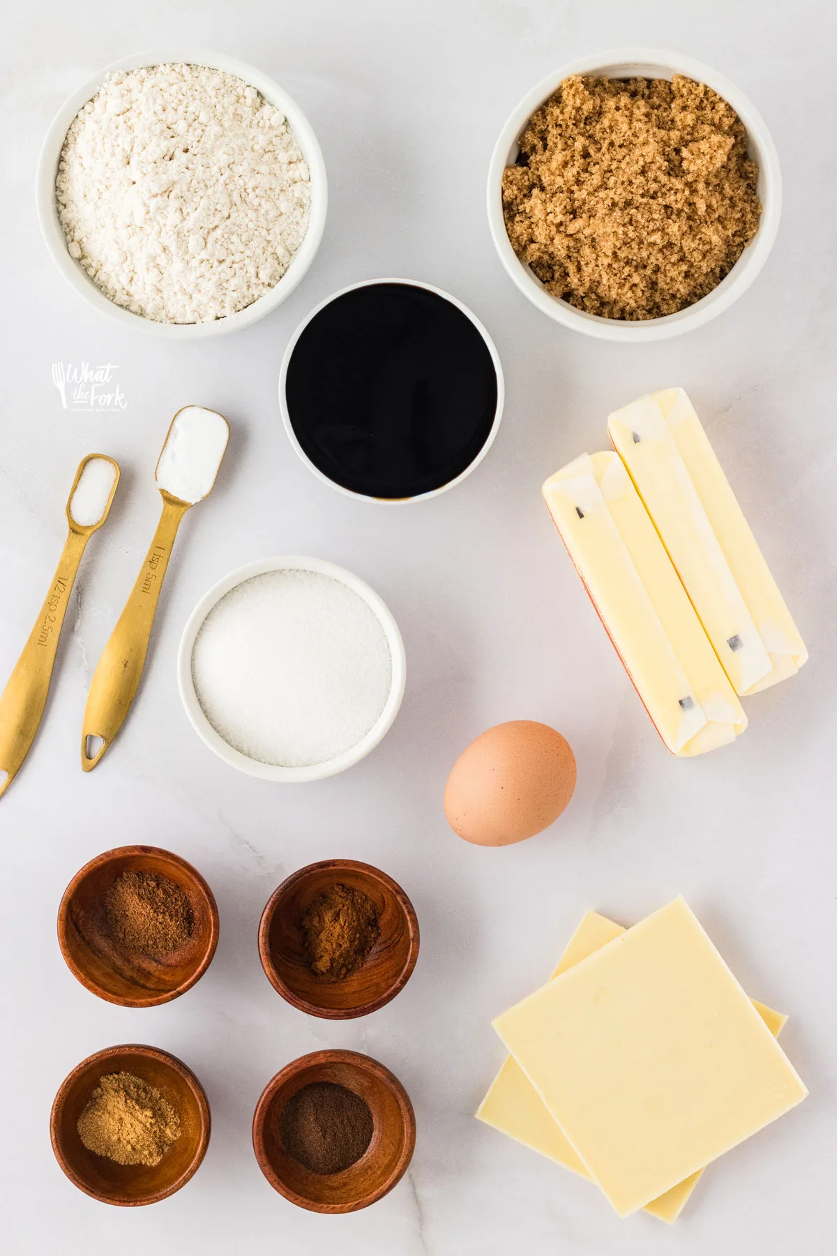 overhead shot of individual ingredients to make gluten free ginger cookies with molasses