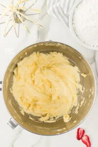 whipped butter in the bowl of a stand mixer