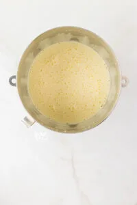 eggs, sugar, and extract whipped together until light in color and tripled in volume