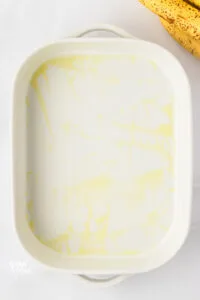 overhead shot of a white 9x13 pan greased