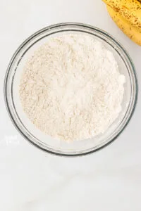 dry ingredients in a clear glass bowl whisked together