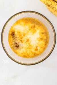wet ingredients in a clear glass bowl